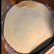 Thinnish dough circle, please note my Moroccan rolling pin